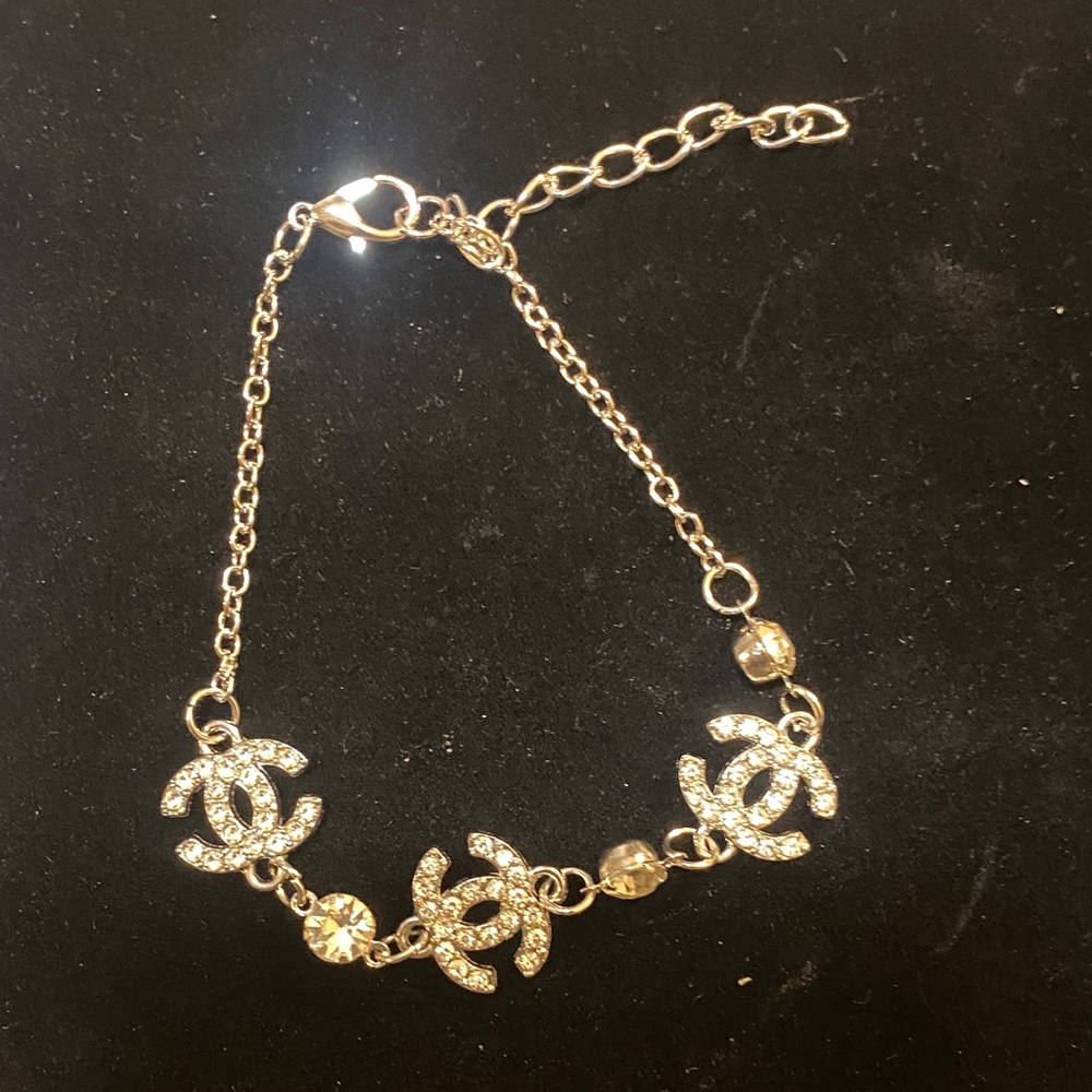 Elegant Silver toned CC Bracelet with Crystal Accents